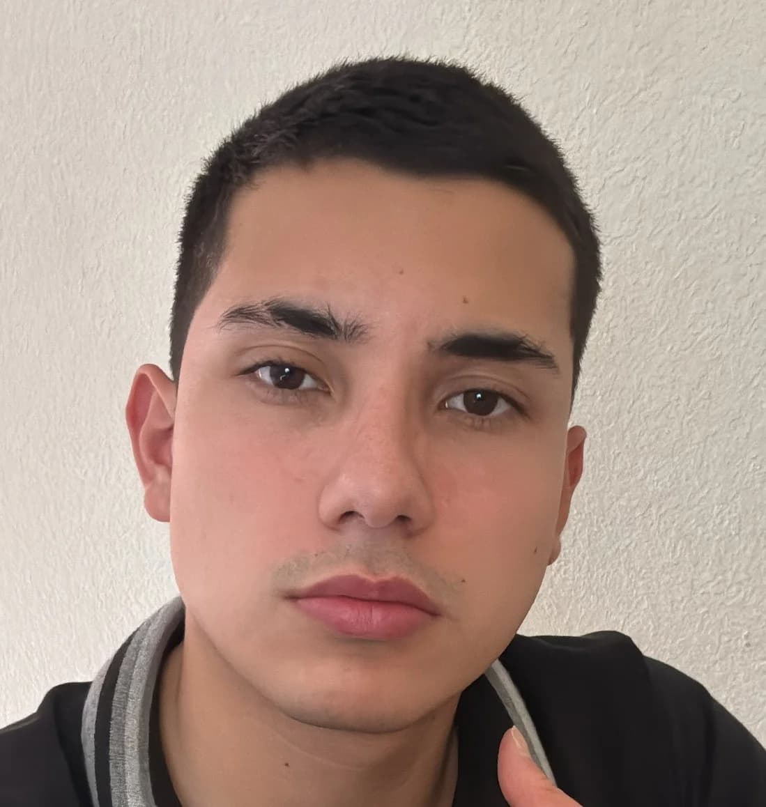 Andres Bonilla in a Tesla roadster